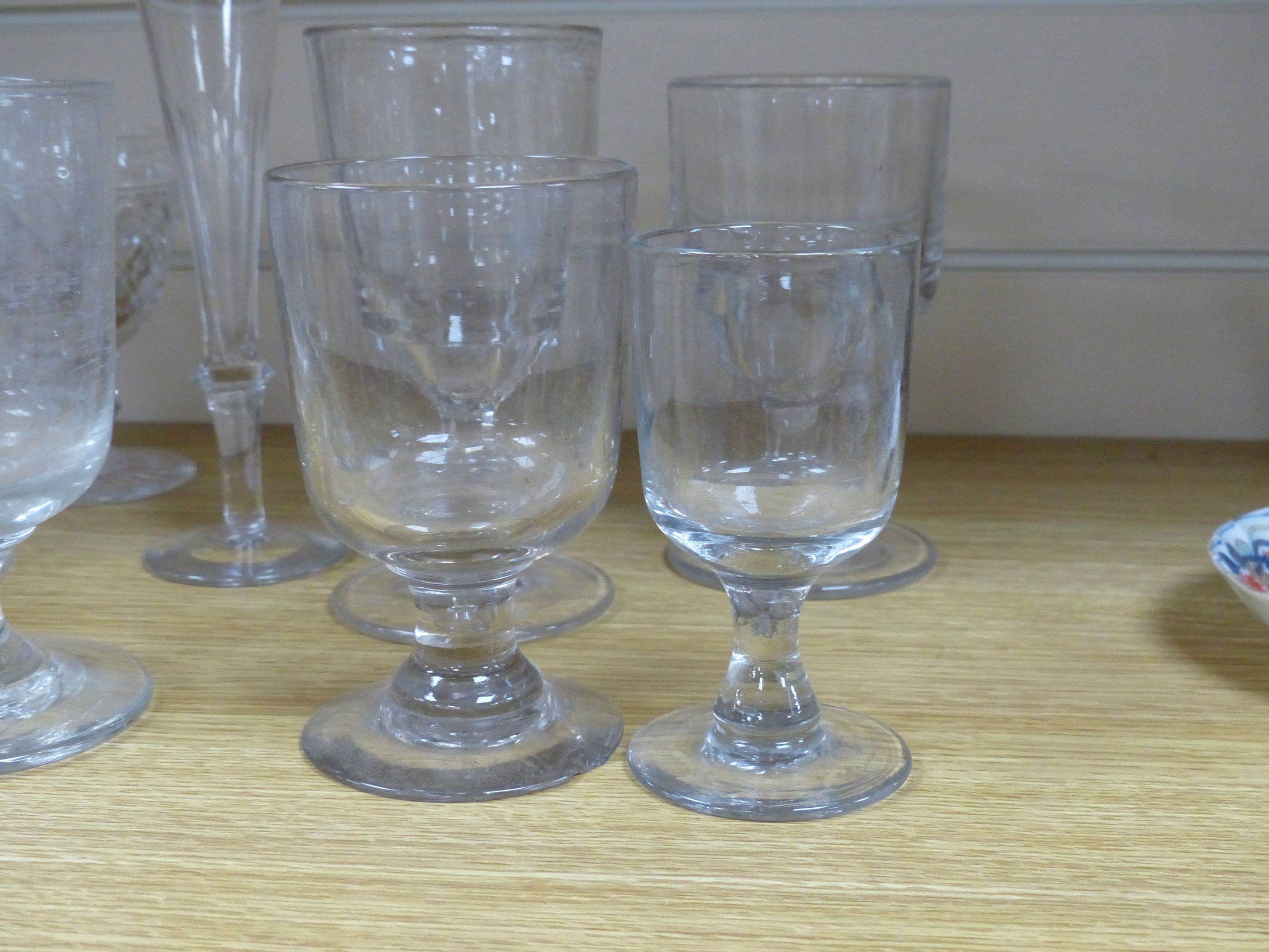 A small collection of wine and ale glasses, rummer height 15cm